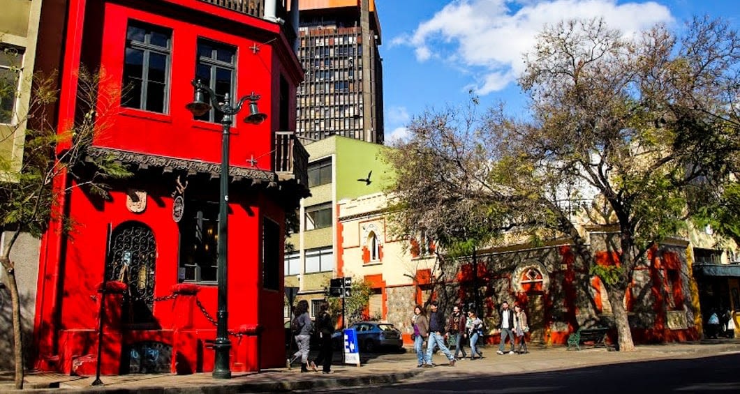 Red building on a Buenos Aires city street, Argentina