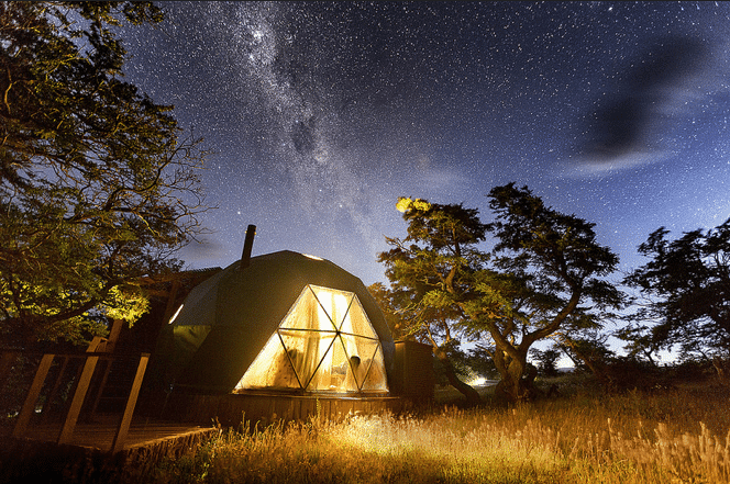 Geodesic dome lodges of EcoCamp at night in Torres del Paine National Park