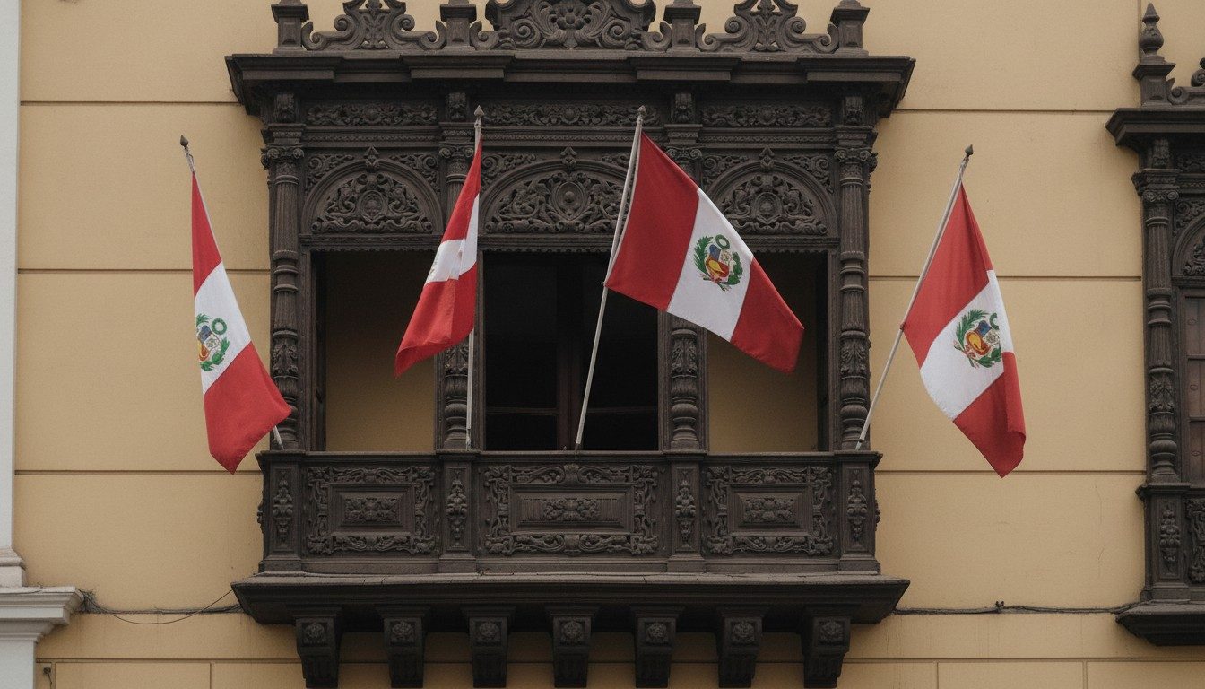 Red and white Peruvian flags hanging from a carved wooden colonial balcony