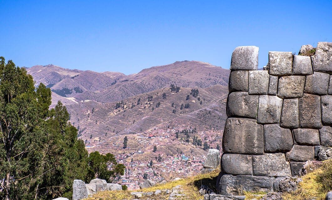 Zigzag Inca stone walls of Sacsayhuaman above Cusco in morning light